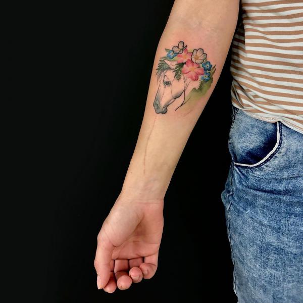 Horse head with flowers tattoo watercolor