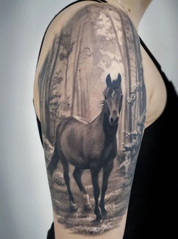 Horse in forest half sleeve tattoo