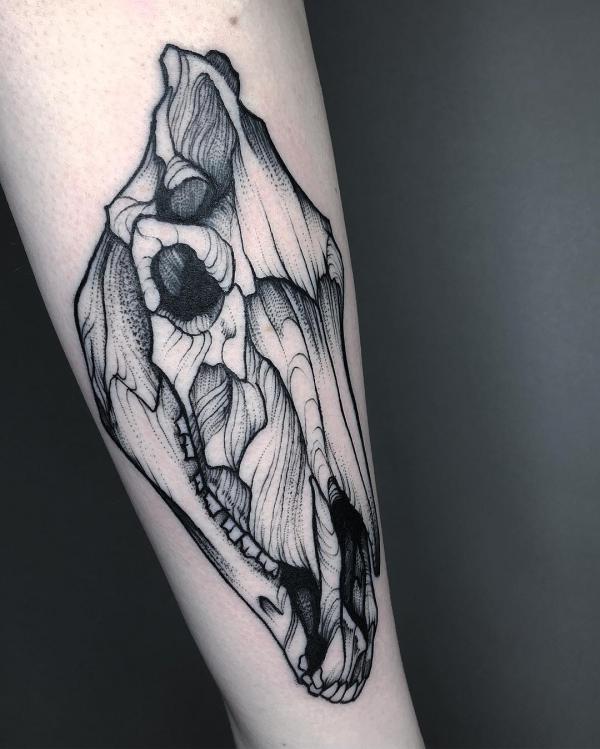 Horse skull forearm tattoo