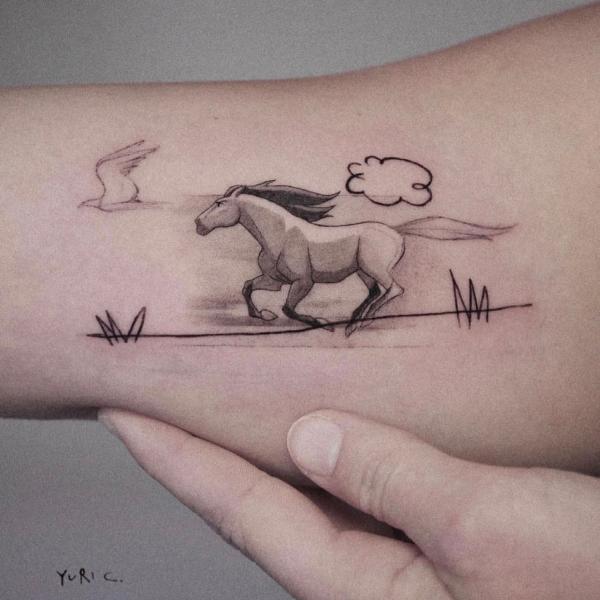 Horse upper arm tattoo