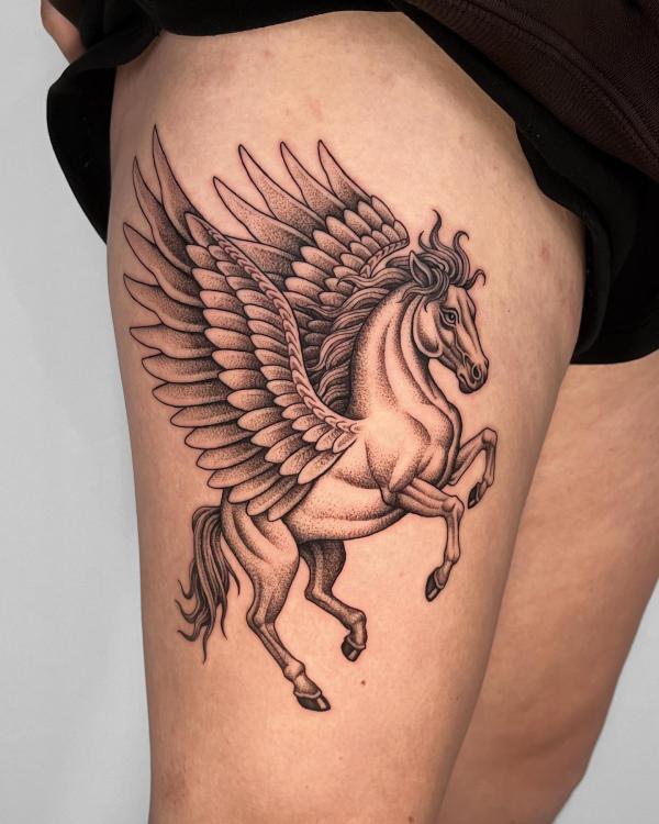 Horse with wings thigh tattoo