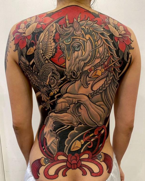 Japanese horse and eagle back tattoo
