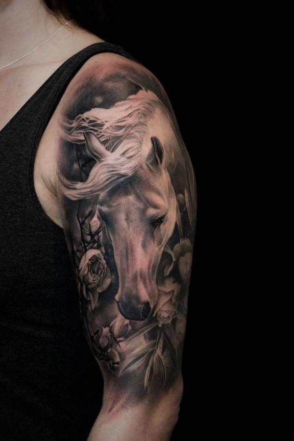 Realistic horse and flower tattoo