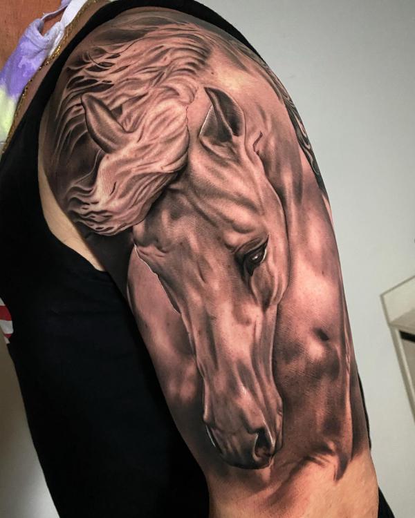 Realistic horse head half sleeve tattoo