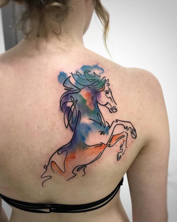 Watercolor horse shoulder blade tattoo