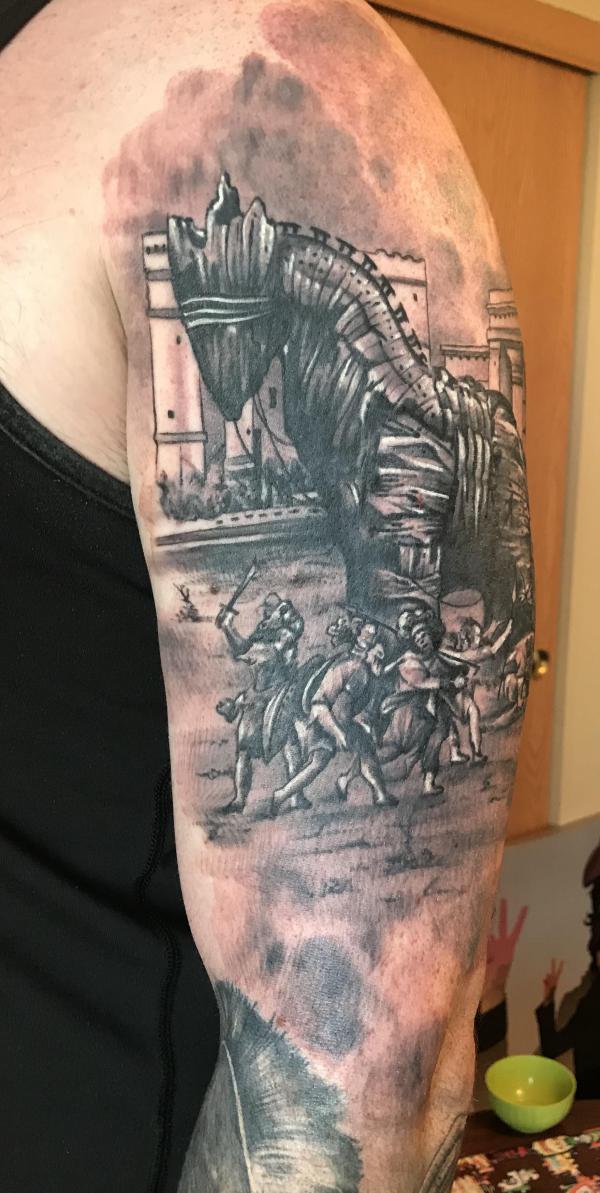 trojan horse half sleeve tattoo