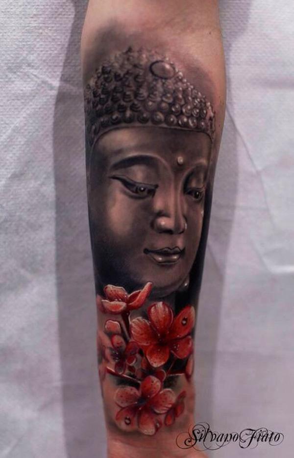 Buddha e flores de cerejeira