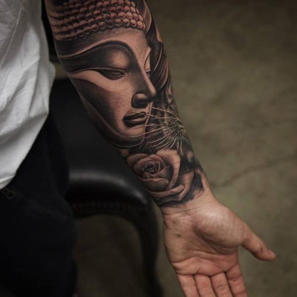 Tatuaggio Buddha sull'avambraccio