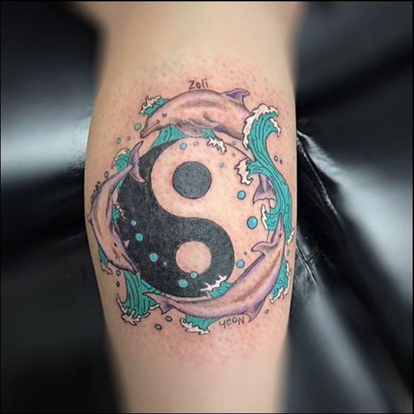 Dolphin and Yin Yang tattoo