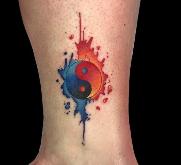Watercolor fire and water yinyang tattoo