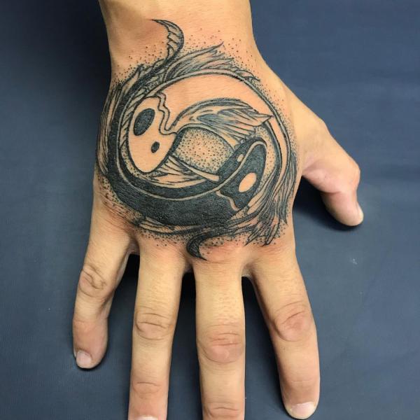 Yin Yang Hand Tattoo
