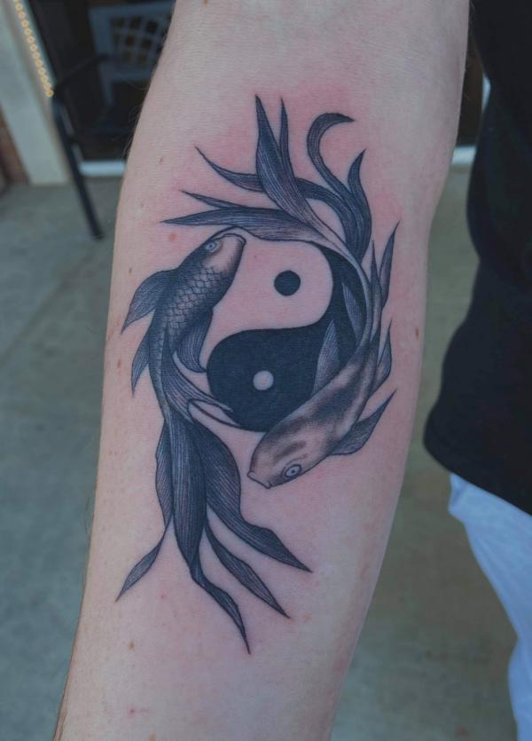 Yin yang pisces tattoo