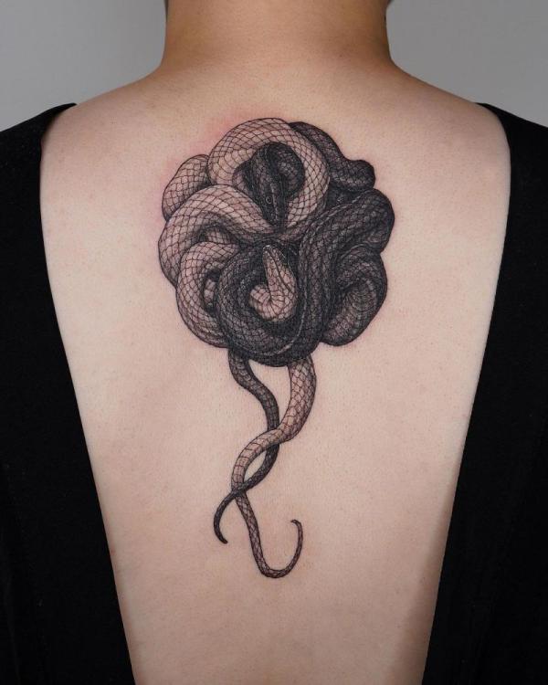 Yin yang snake tattoo