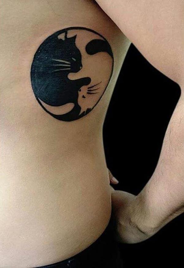 Simple Yin Yang cat tattoo