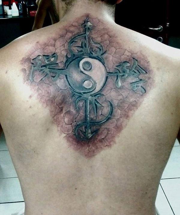 Celtic Yin Yang Symbol on cracked skin
