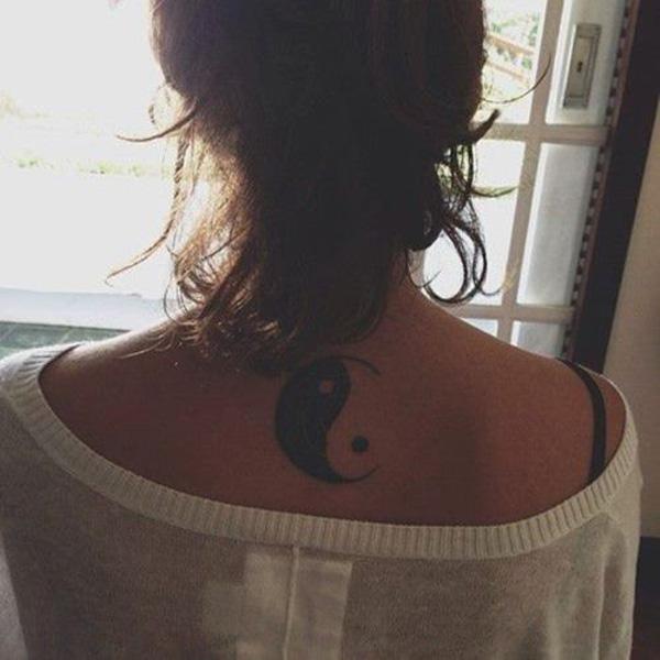 yin yang neck tattoo for girl