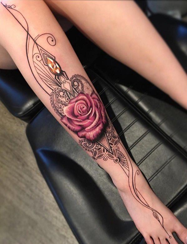 Colourful flowers tattoo on calf  Flower leg tattoos Calf tattoo  Colorful flower tattoo