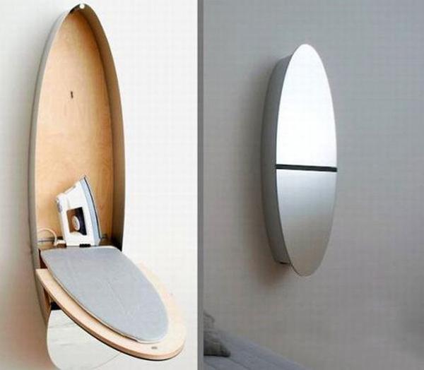 ironing board with mirrored door and small storage