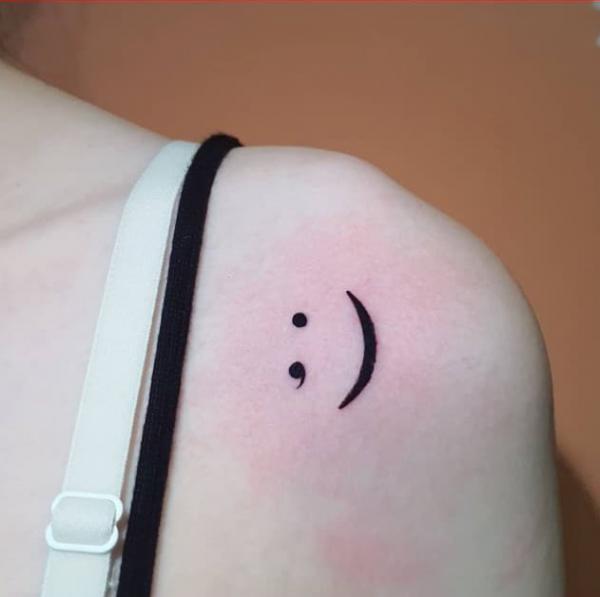 Semicolon smiley face tattoo