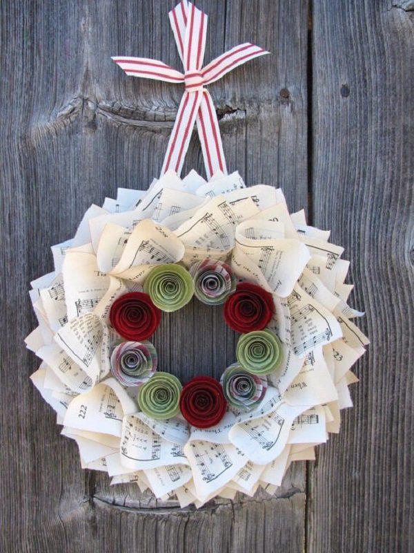 music-wreath-for-christmas-with-red-and-green-flowers