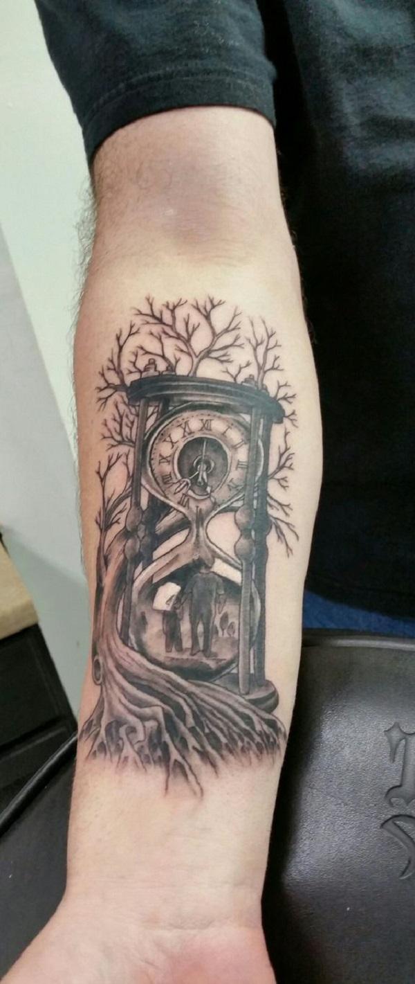 Black and grey hourglass tattoo done on the wrist