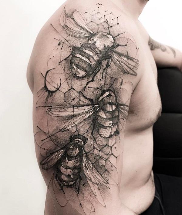 Large quarter sleeve tattoo with bees on honeycomb