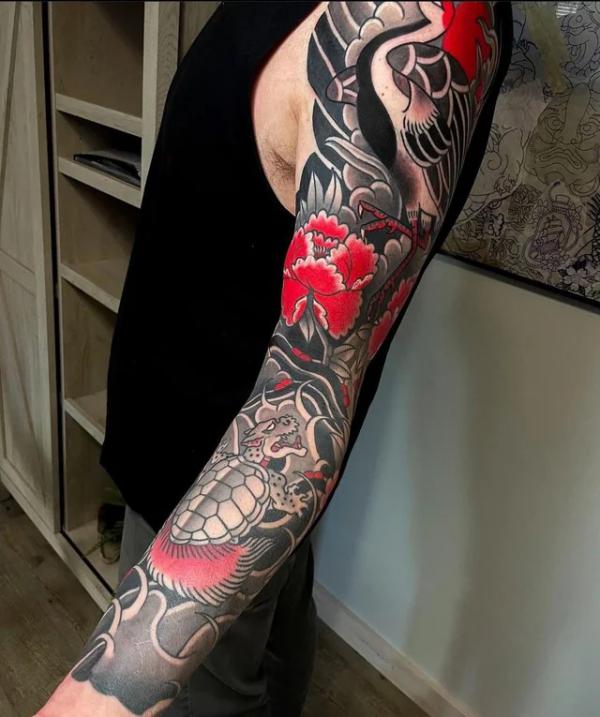 Japanese turtle crane and peony tattoo sleeve