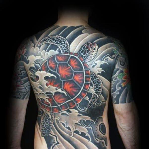 Japanese wave and turtle full back tattoo