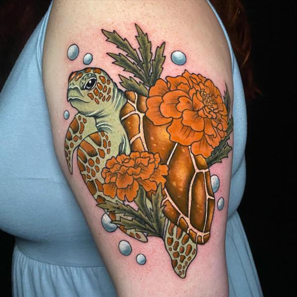Neo traditional turtle and Marigold tattoo