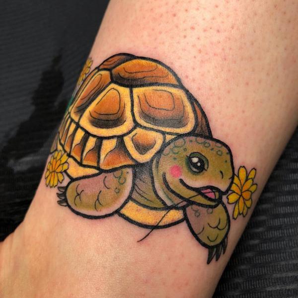 Neo traditional turtle with flower tattoo