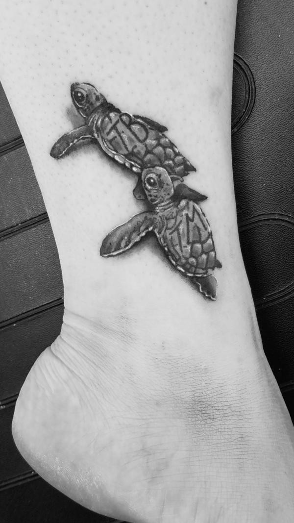 Small turtle ankle tattoo black and grey
