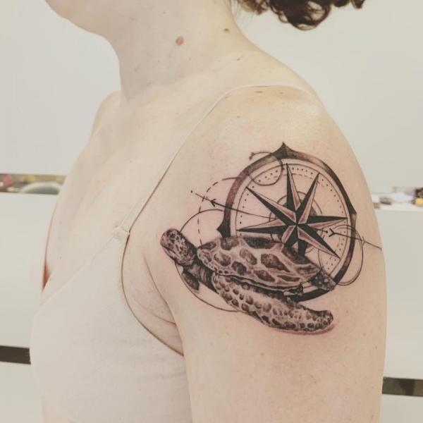 Turtle and compass shoulder tattoo