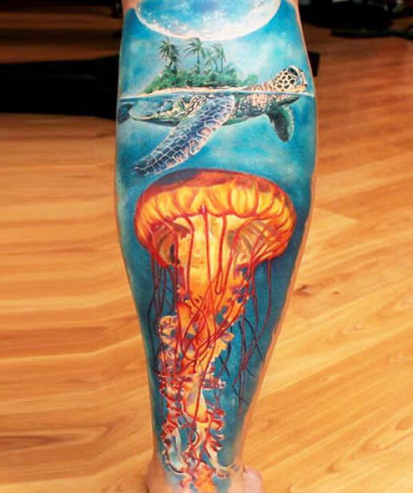 Turtle and jellyfish calf tattoo