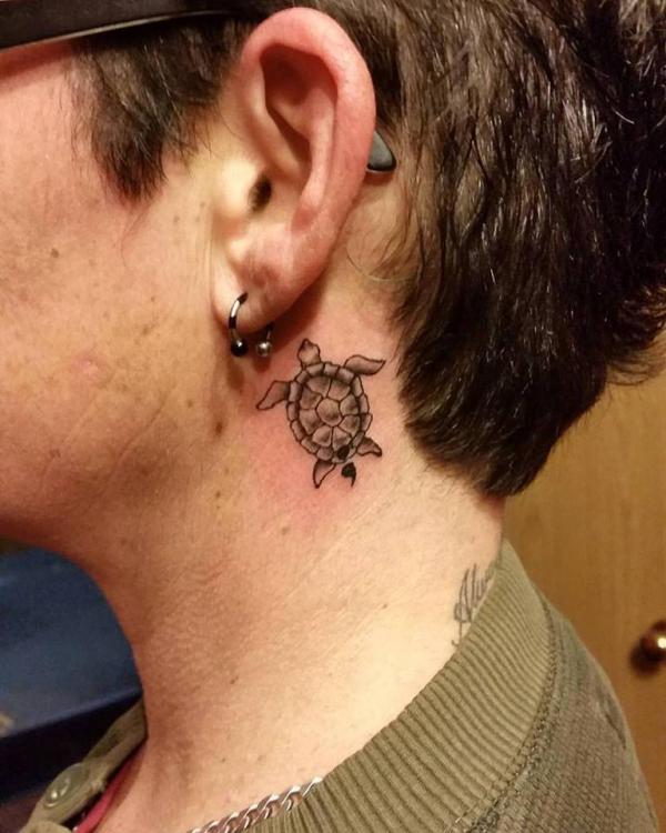 Turtle tattoo behind ear