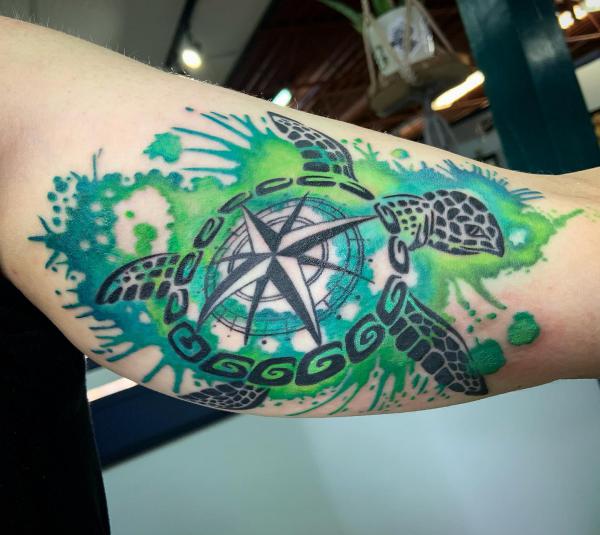 Watercolor compass turtle tattoo