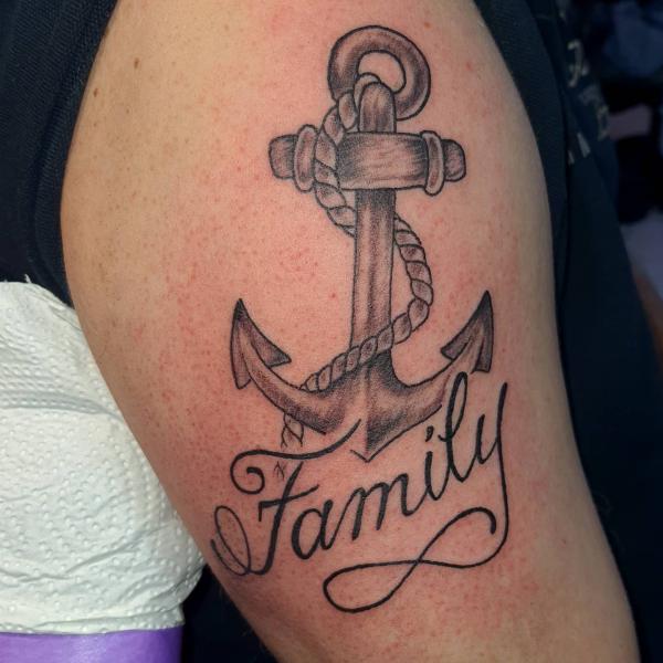 Anchor family infinity tattoo on thigh