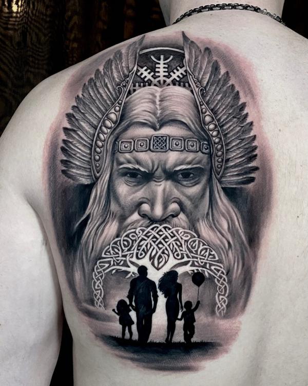 Celtic family tattoo on shoulder blade