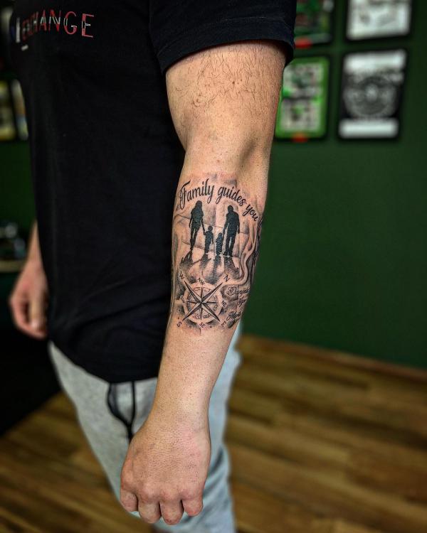 Family and compass tattoo with words Family guides you