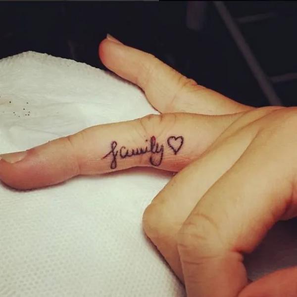 Family and love finger tattoo