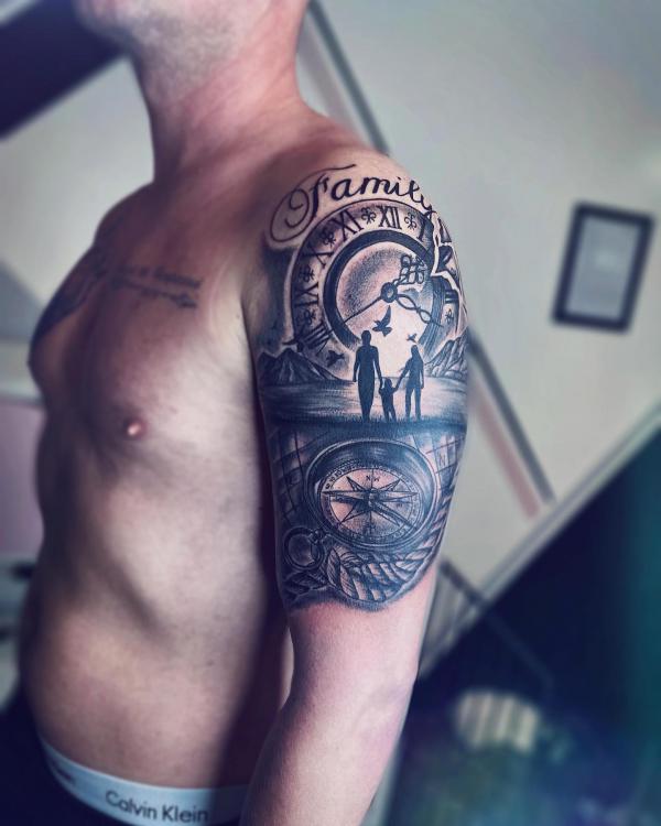 Family with clock and compass tattoo