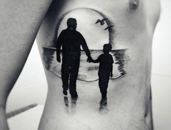 Father and son rib tattoo in black and white