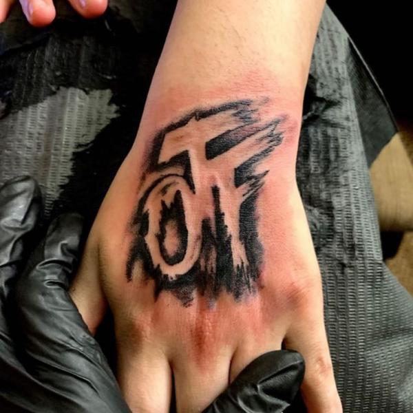 OTF hand tattoo