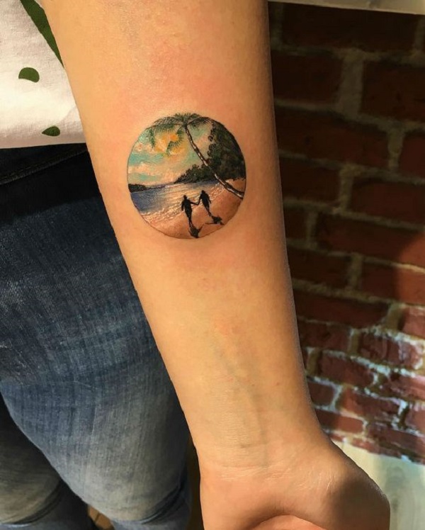 miniature family sunsut tattoo on forearm