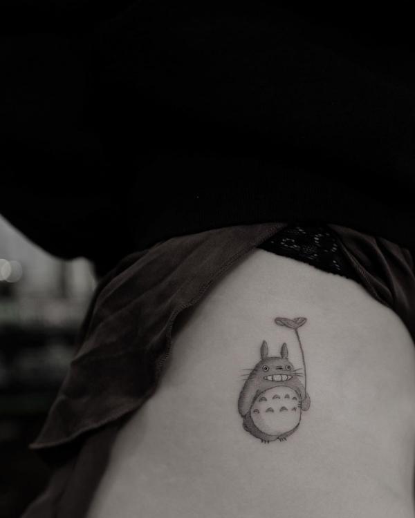 Cute Totoro tattoo on the side