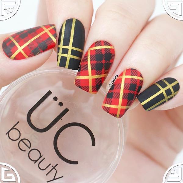 French manicure with black, red, and golden tartan and stripes. 