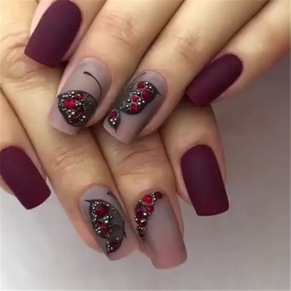 Red and black rhinestone butterfly with red nail art 23