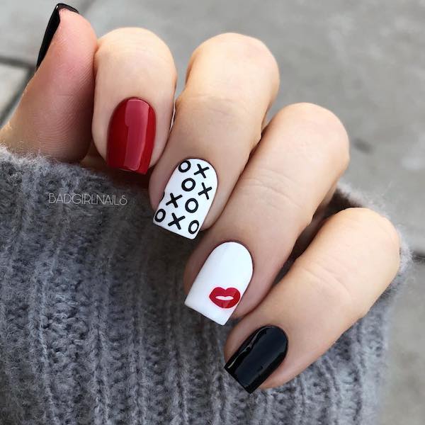 Red lip on white nail bed