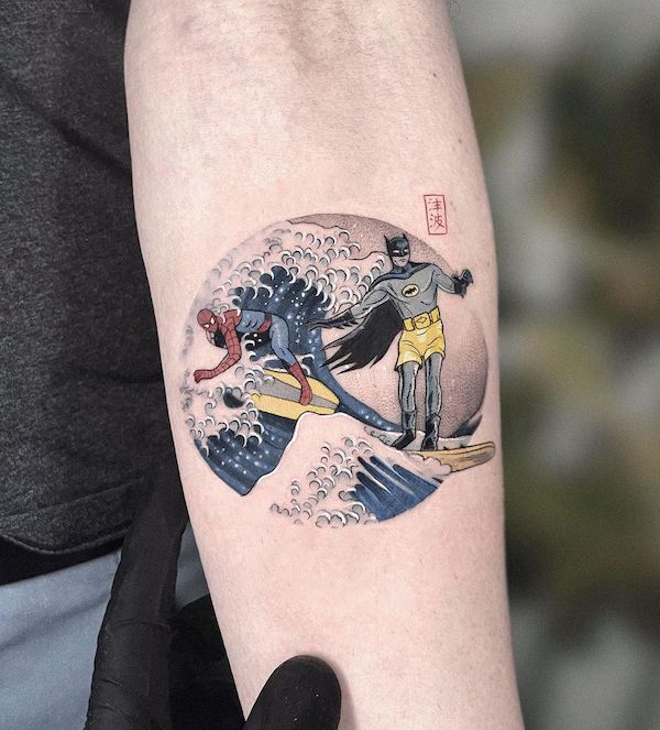 Bat man in Great Wave arm tattoo
