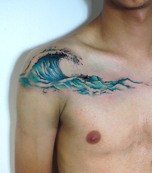 Blue wave clavicle tattoo