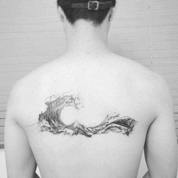 Impressive Great wave tattoo on back